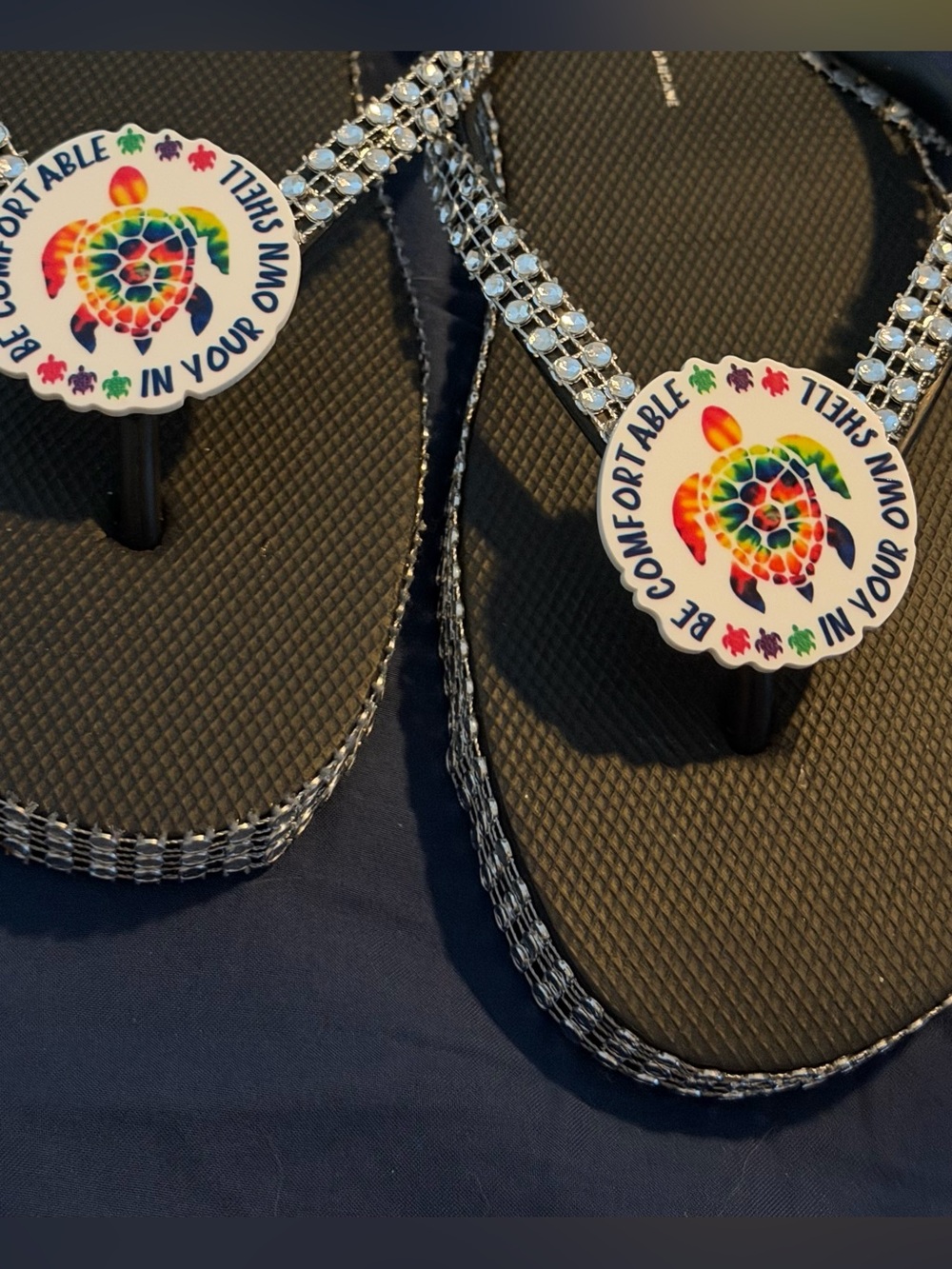 Black Bejeweled Flip Flops with Rainbow Turtle Accent